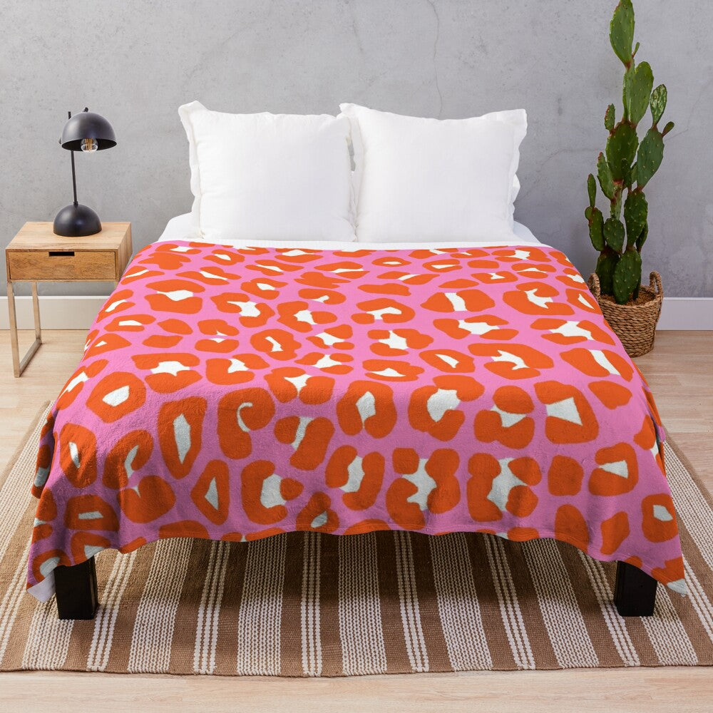 Colorful leopard print plush blanket with celestial and space design