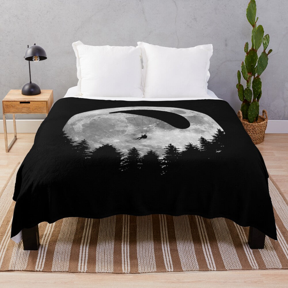 Paragliding Moon Plush Blanket featuring a serene mountain landscape and a full moon