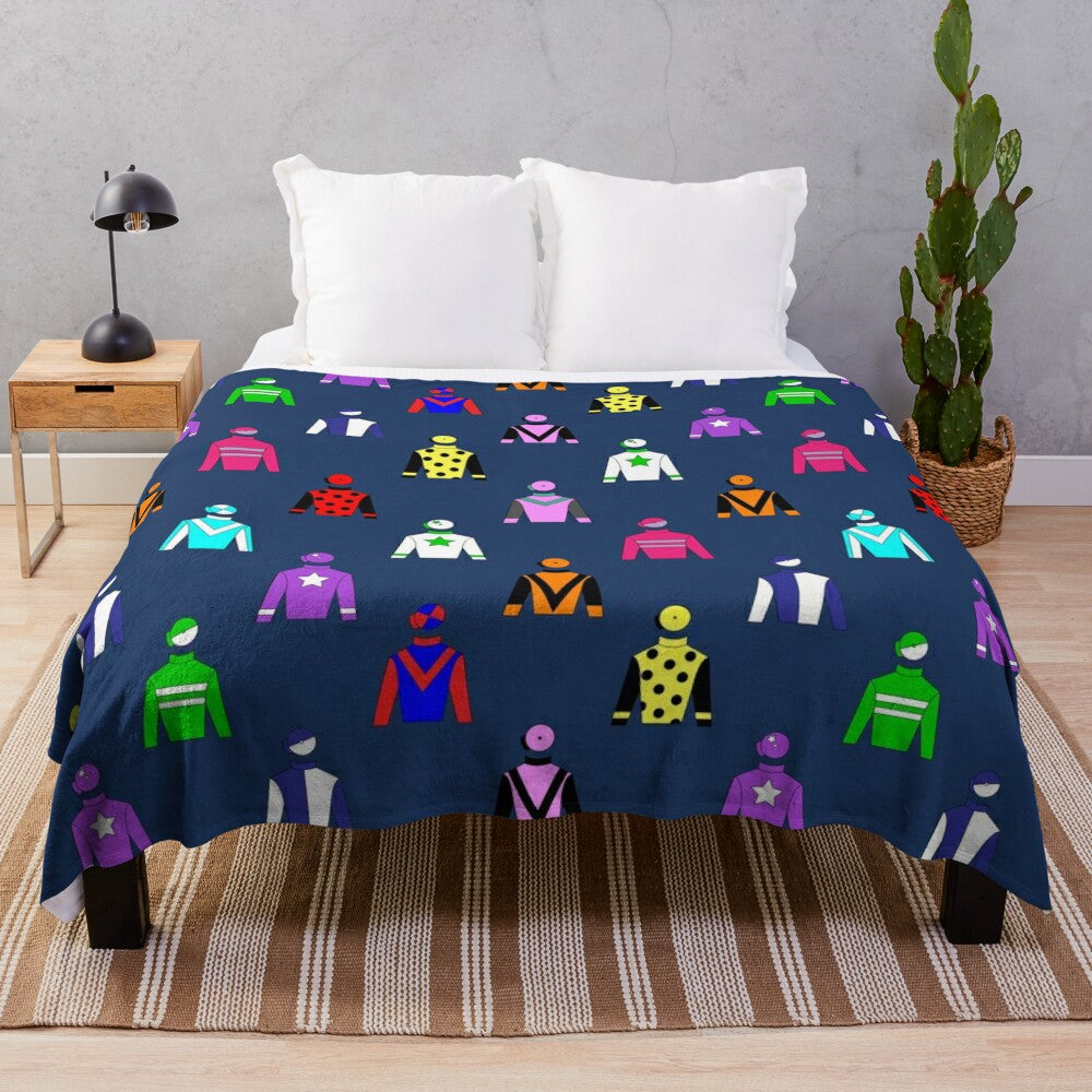 Colorful horse racing jockey silks pattern on navy blue plush blanket