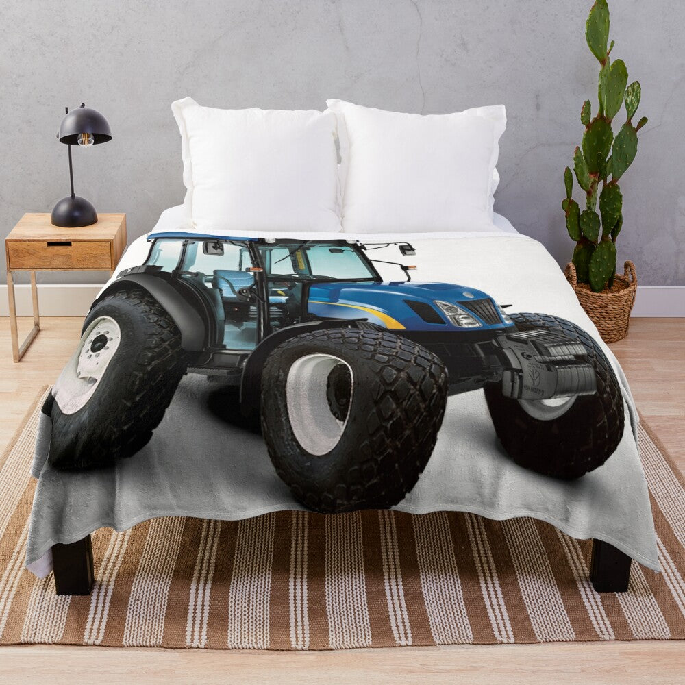 A soft and plush blue blanket featuring a tractor design, perfect for adding farmhouse style to your home.