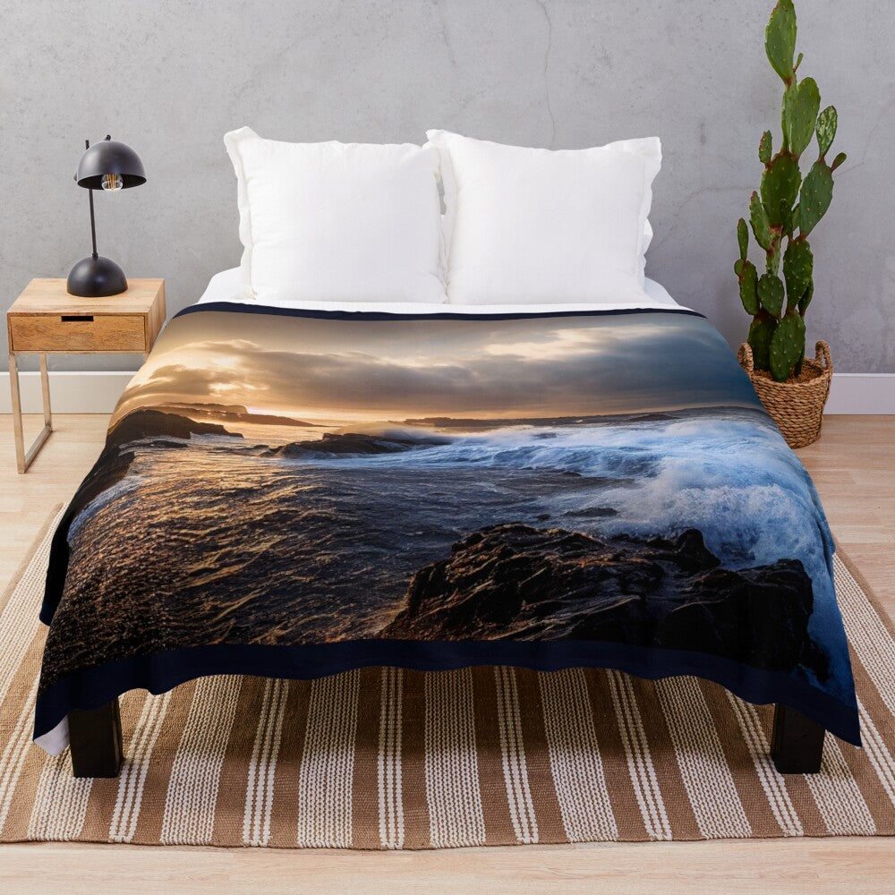 Plush blanket with a serene seascape design featuring waves, beach, and nature