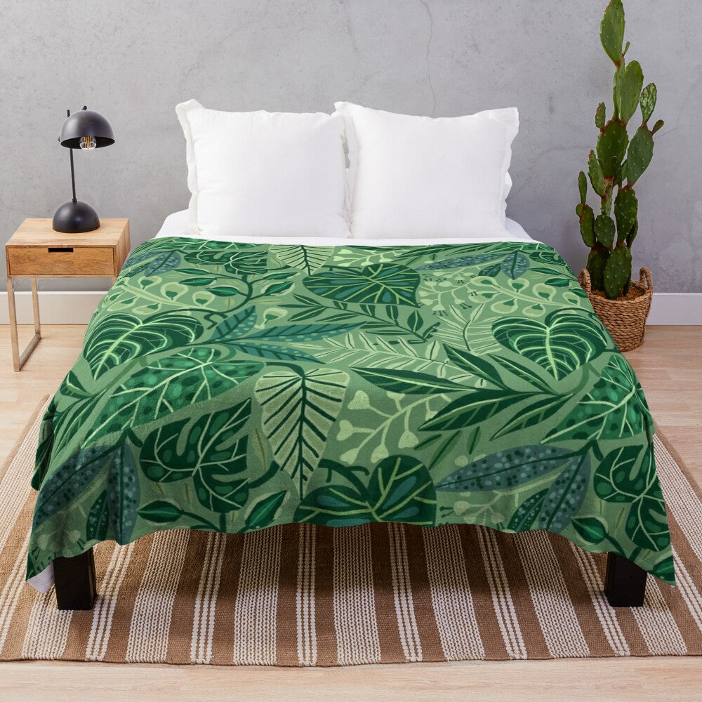 Plush blanket with a tropical leaves and jungle pattern design