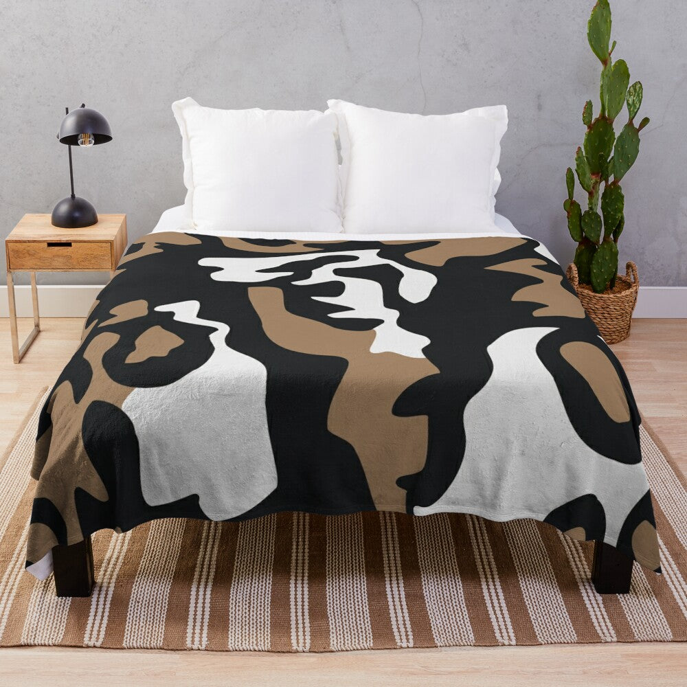 Cozy plush blanket featuring a vibrant pattern of the critically endangered African wild dog