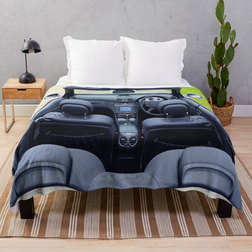 Soft and cozy plush blanket featuring a sports car design