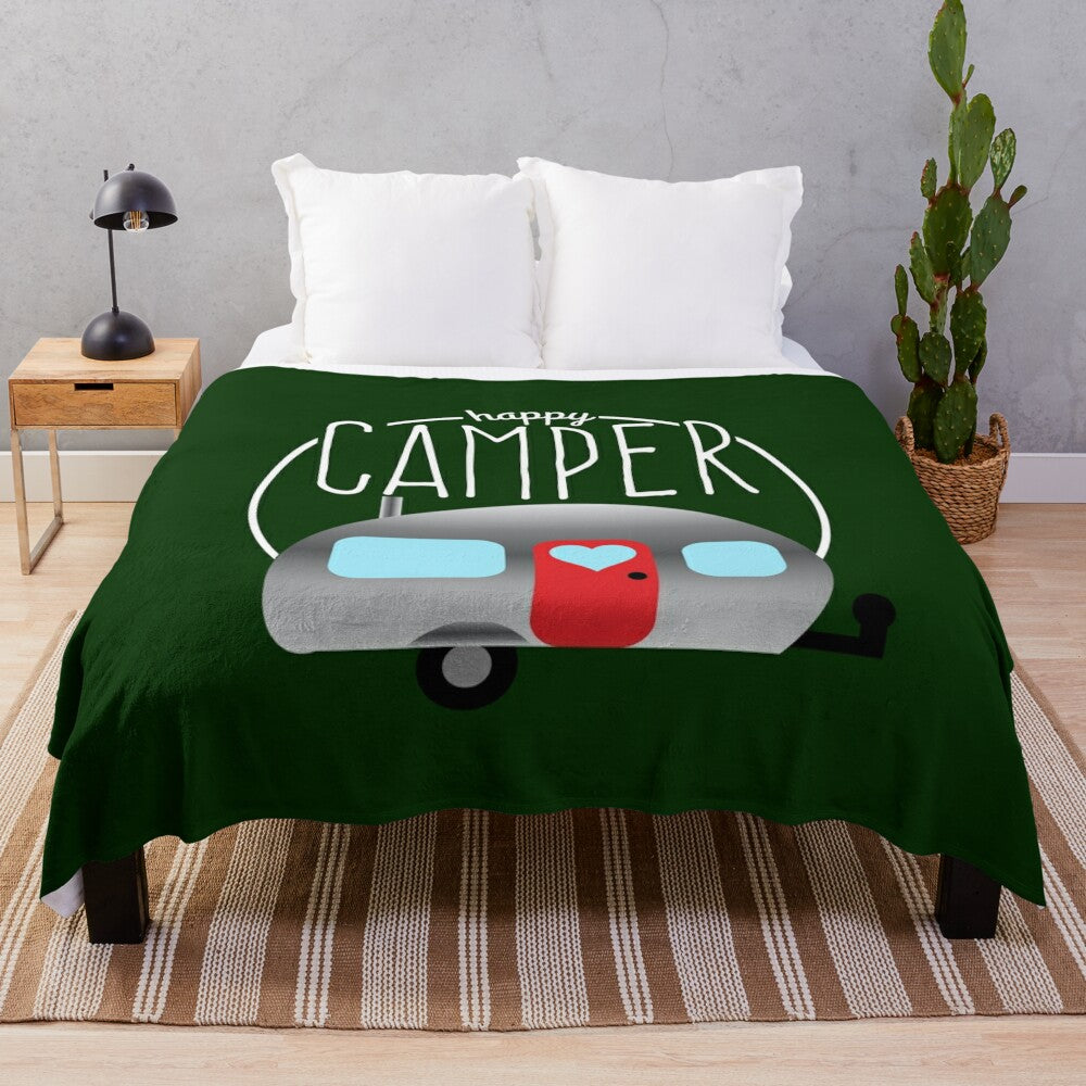 Cozy plush blanket with a retro-inspired happy camper design