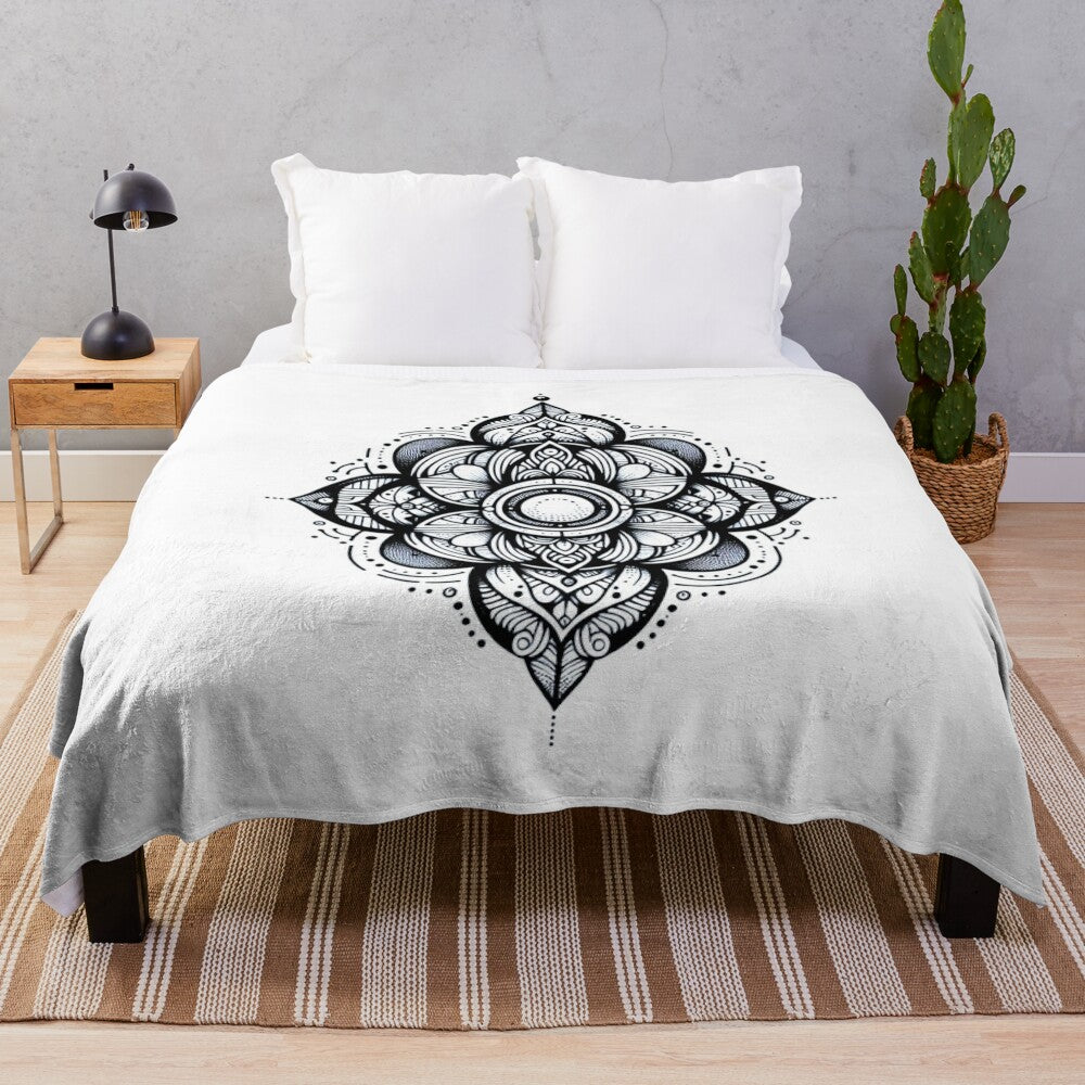 Zentangle-inspired nautilus spiral plush blanket featuring intricate black and white geometric patterns