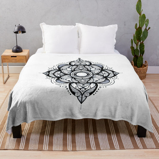 Zentangle-inspired nautilus spiral plush blanket featuring intricate black and white geometric patterns