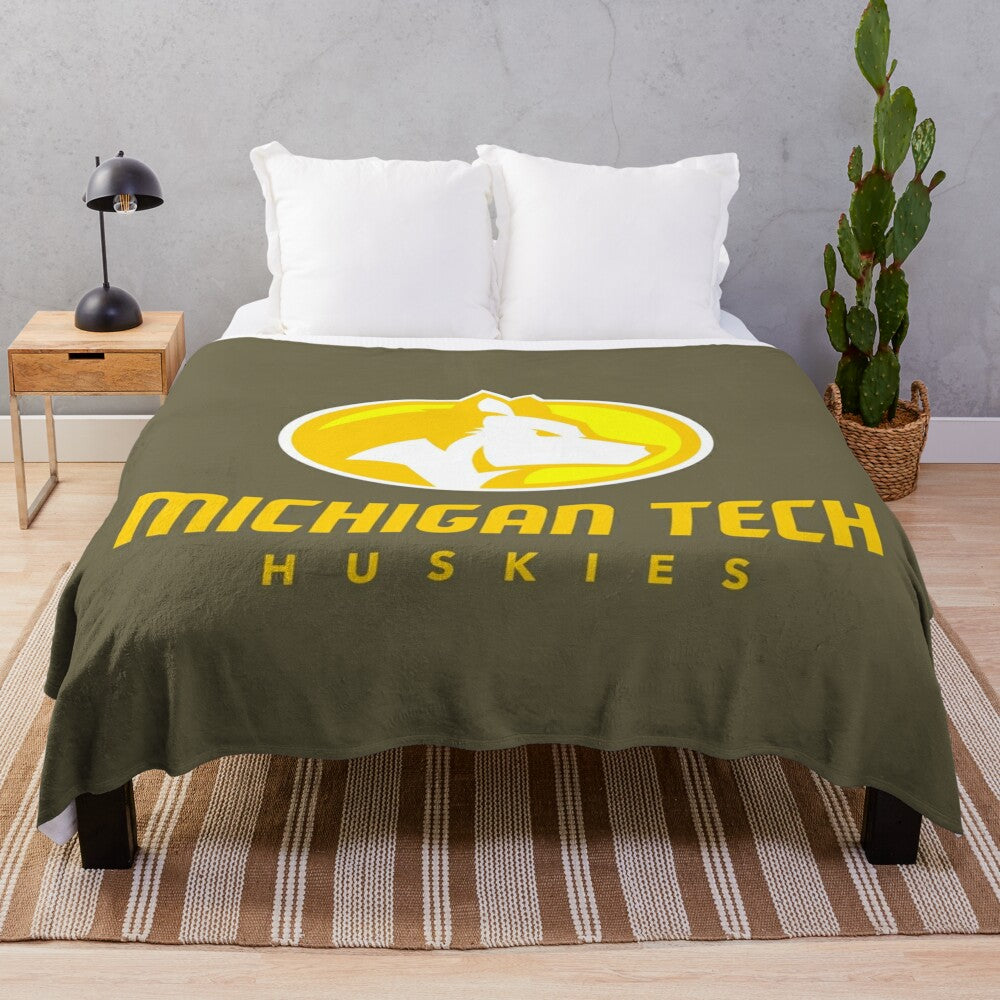 Soft and comfortable plush blanket in Michigan Tech colors