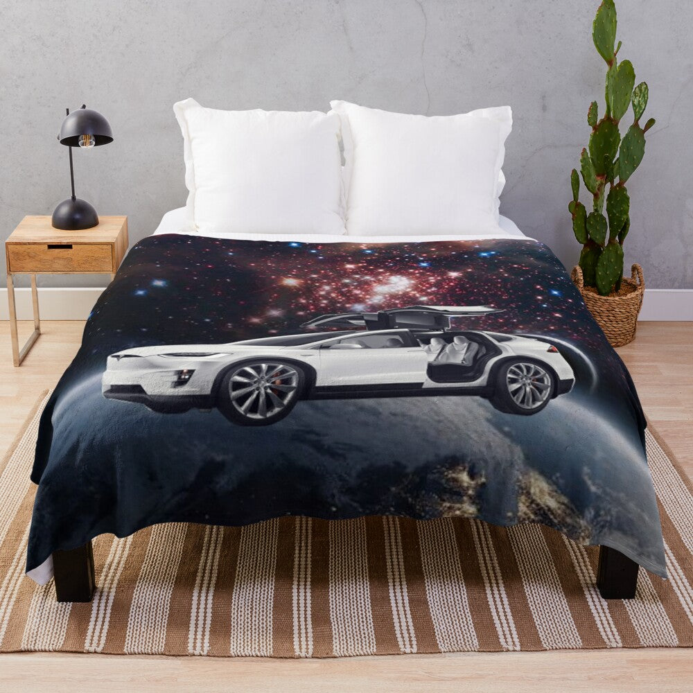 Plush galaxy-themed blanket with Tesla car design