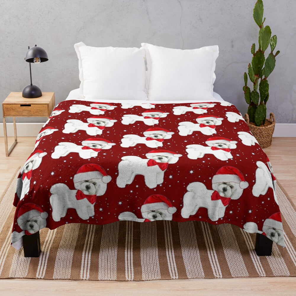 Bichon frise dog wearing a Santa hat on a cozy plush blanket