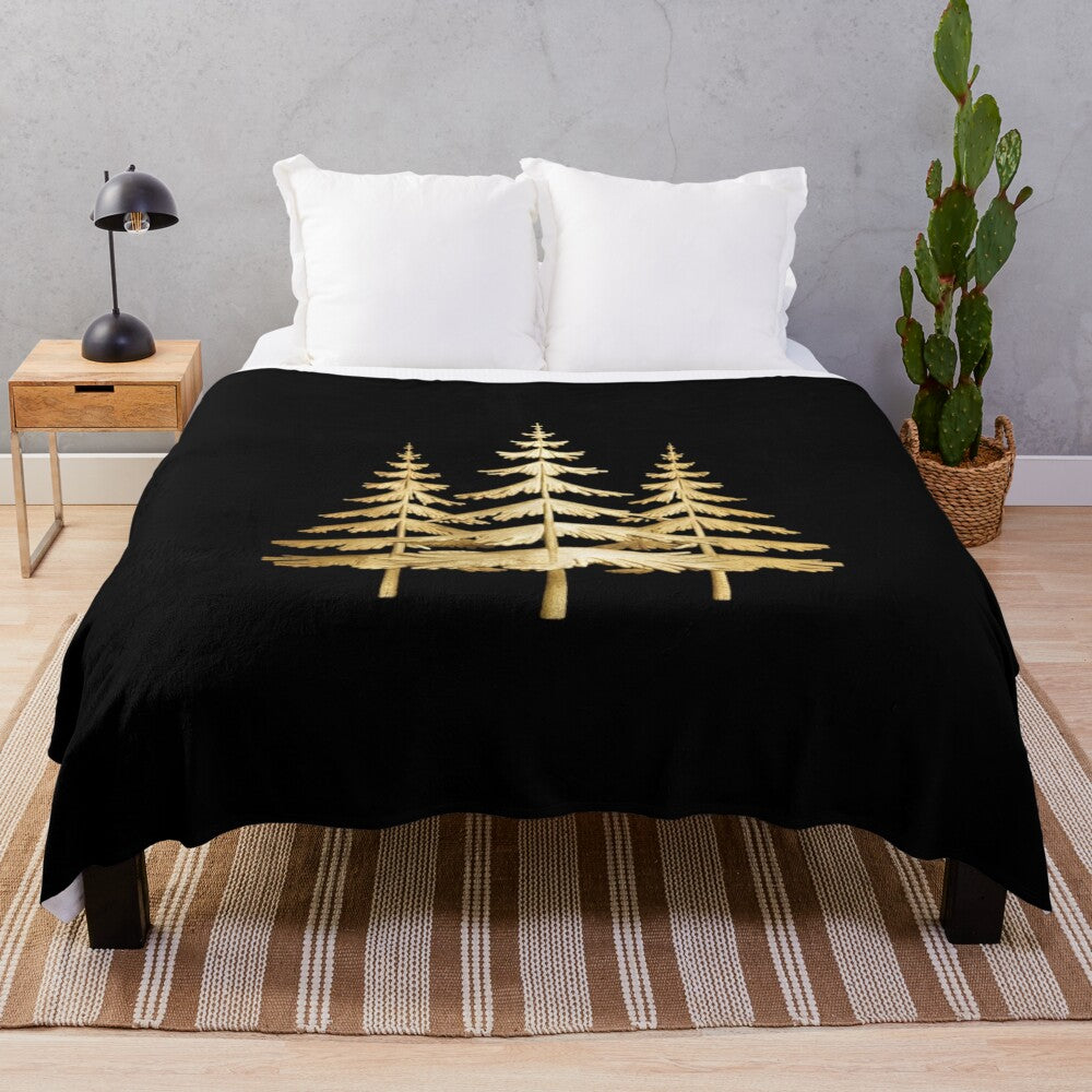 Plush blanket with an abstract design of three gold pine trees against a green and white background