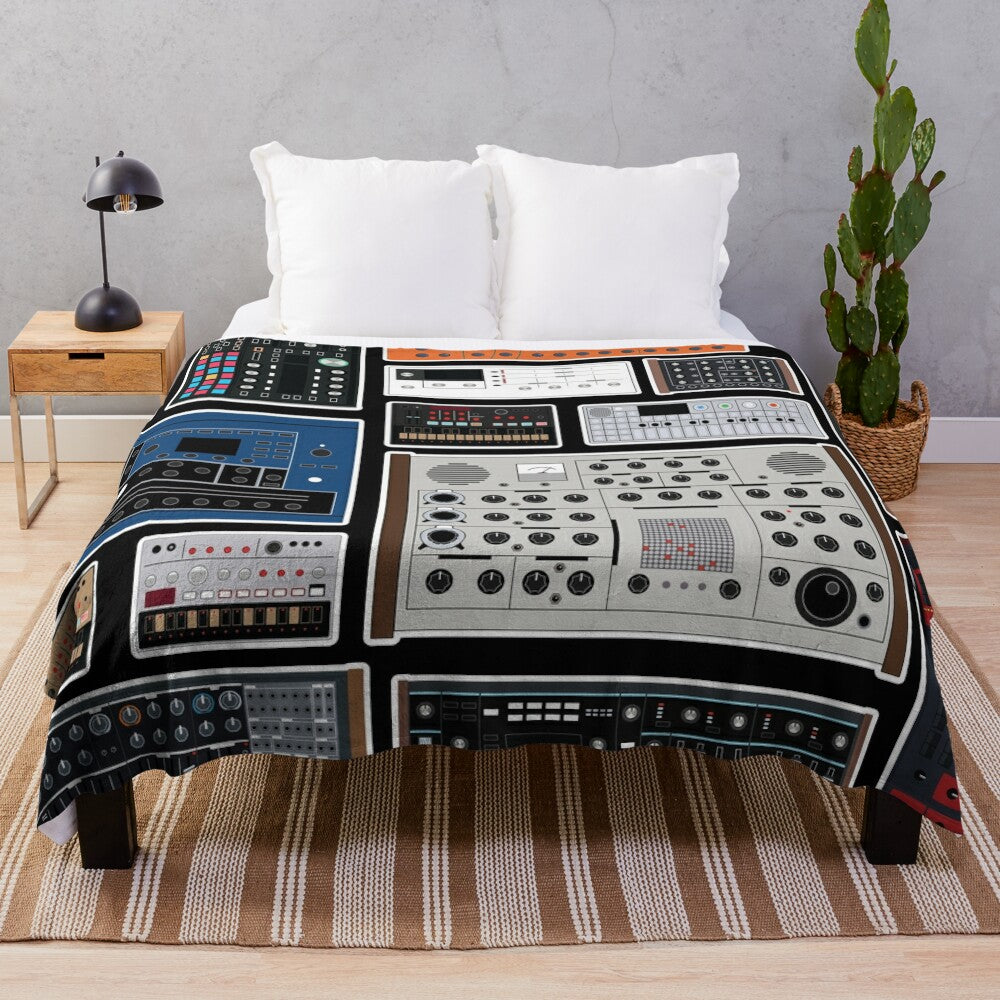 Plush blanket featuring synthesizer and electronic music-inspired design