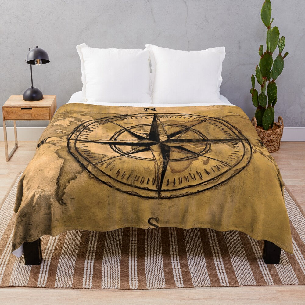 Plush blanket featuring an old world map design and compass rose