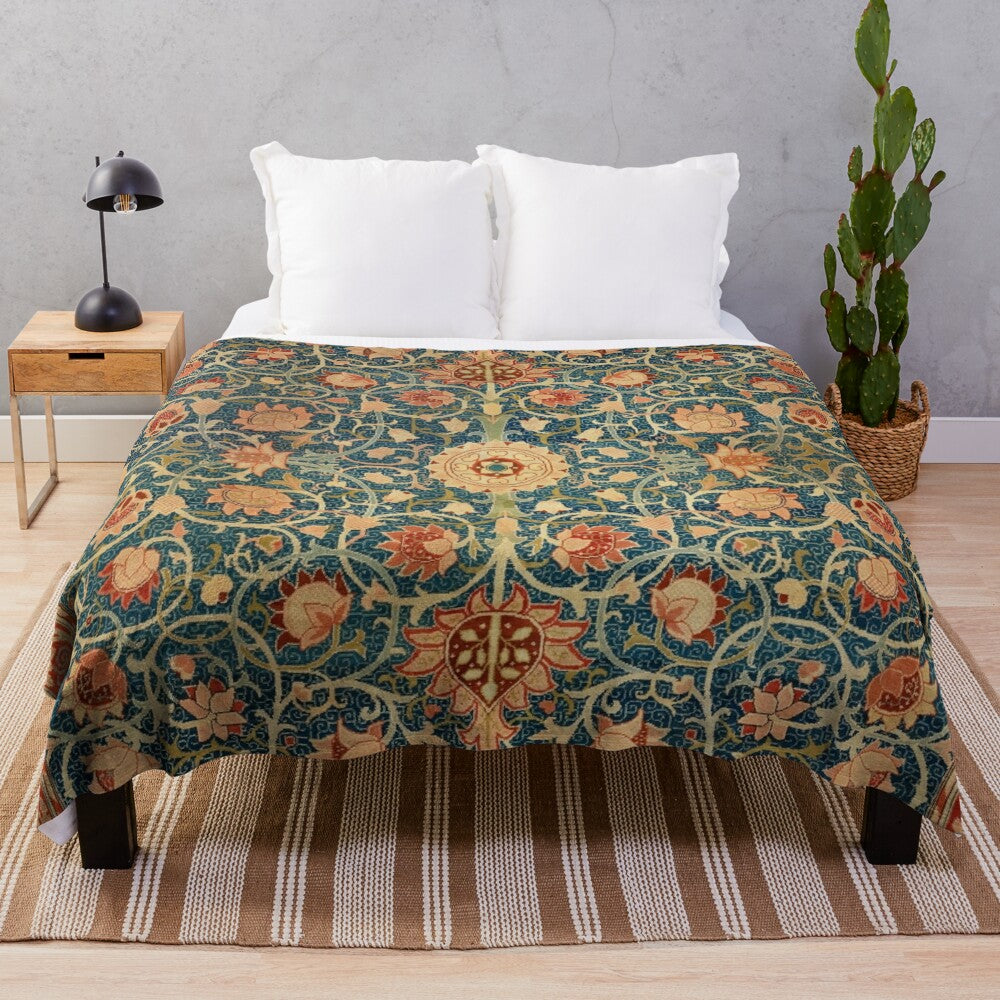 Vintage-inspired plush blanket featuring a William Morris-style floral carpet print in teal and red