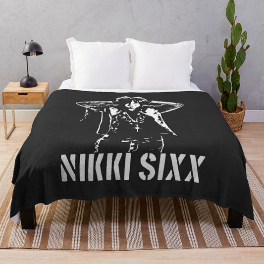 Rare Nikkí Síxx-inspired plush blanket with a soft and cozy design for anime fans.