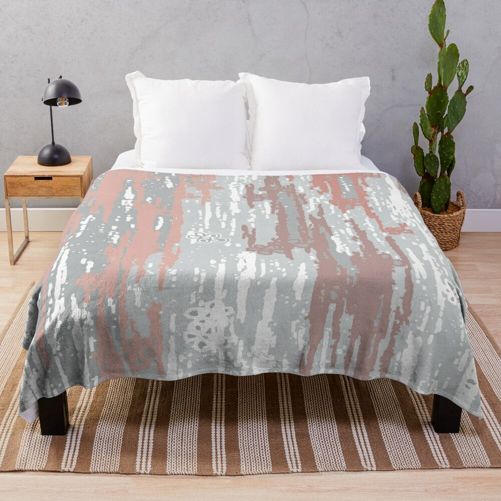 Rose gold abstract plush blanket with colorful gradient and contemporary geometric design