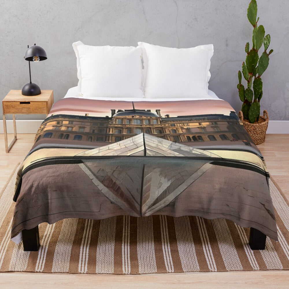 Plush blanket featuring an illustration of the iconic Louvre Museum in Paris