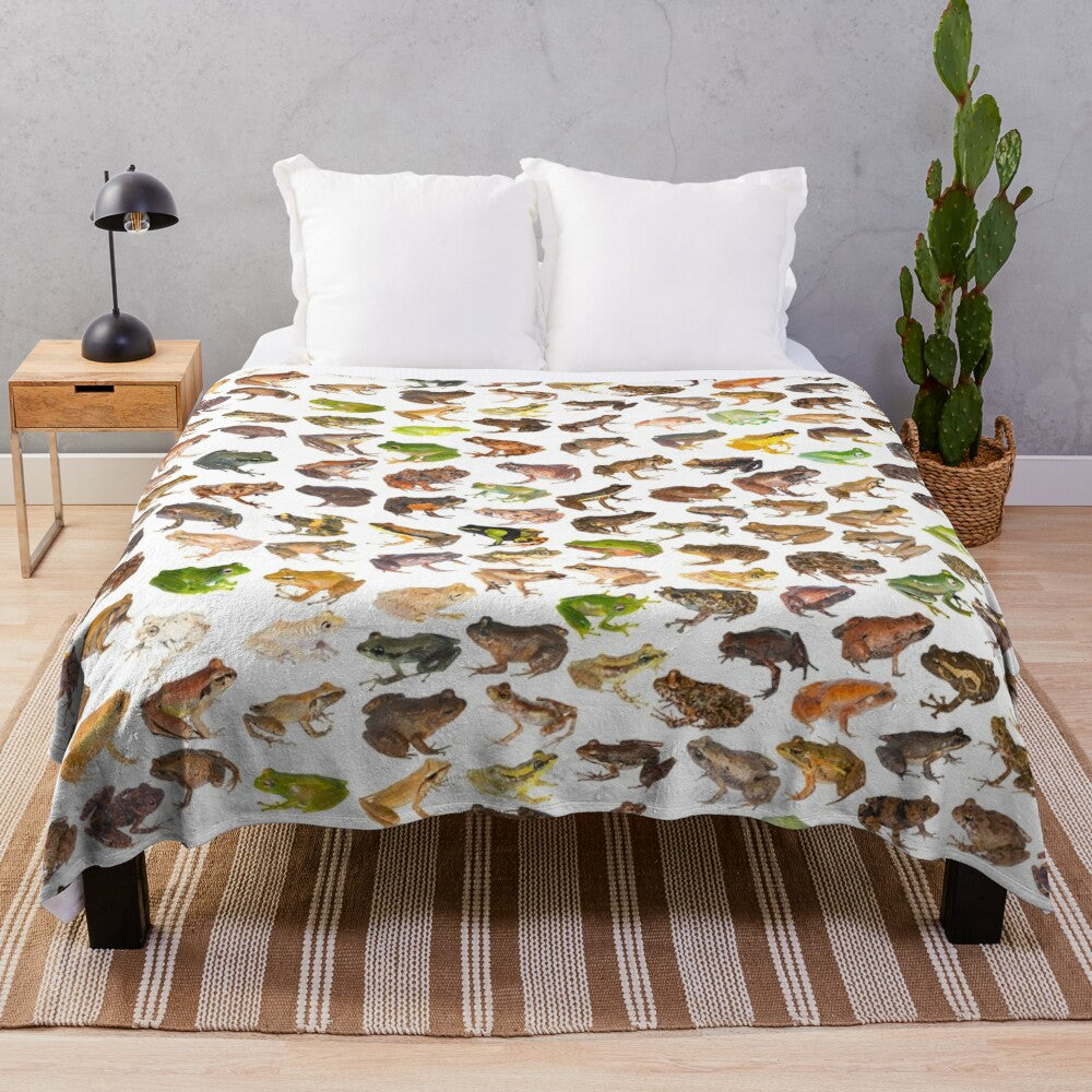 Plush blanket featuring a colorful illustration of 101 frog species found in Madagascar