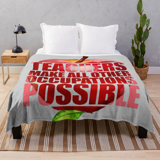 Plush blanket with "TEACHERS MAKE ALL OTHER OCCUPATIONS POSSIBLE" text and teaching-themed design