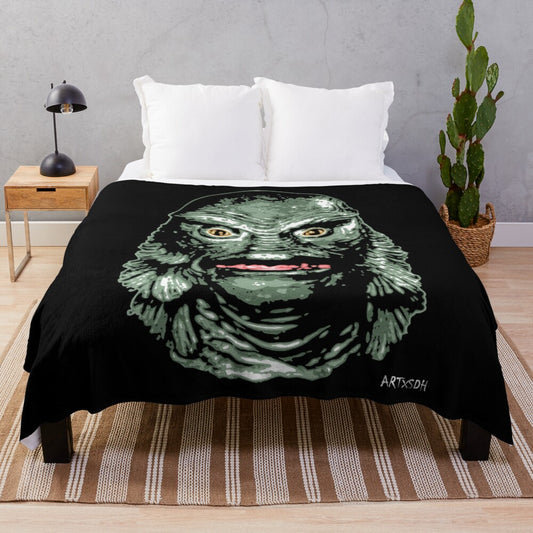 Creature from the Black Lagoon-inspired plush blanket featuring classic horror movie imagery