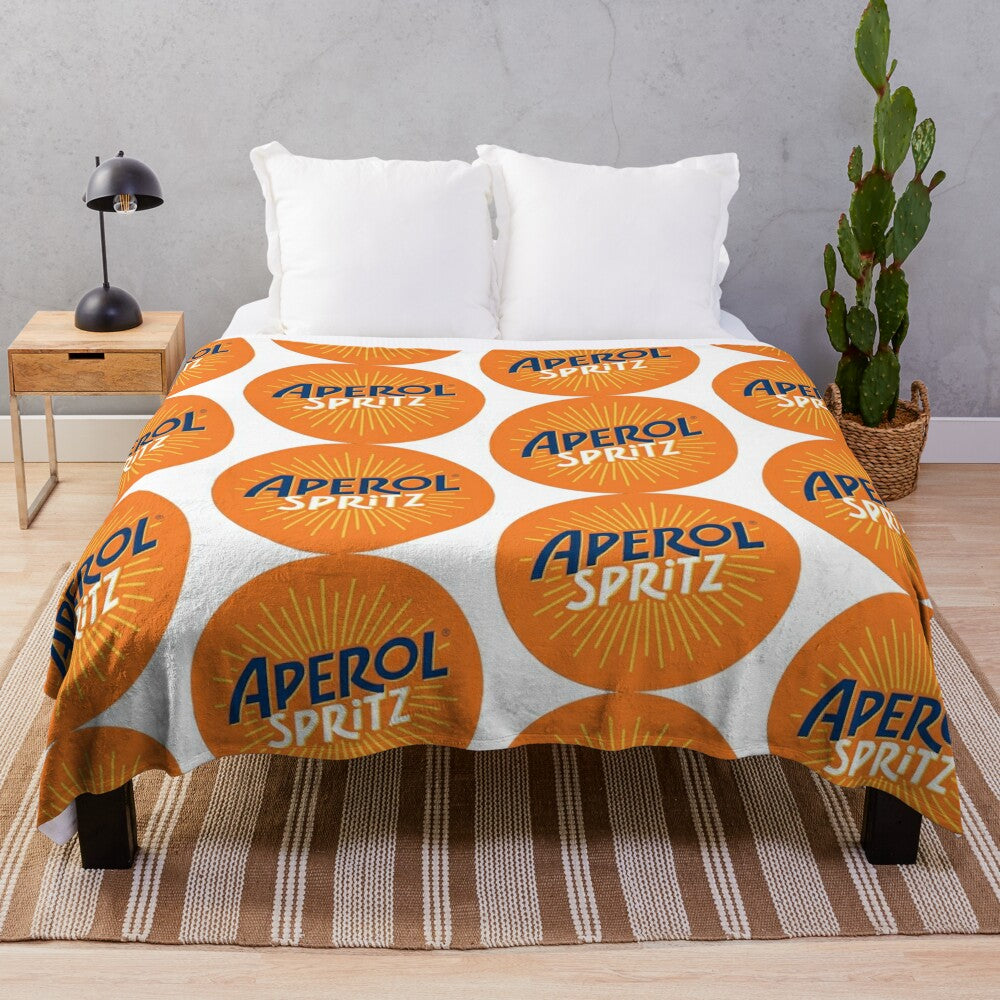 Soft and plush blanket featuring the iconic Aperol Spritz cocktail design