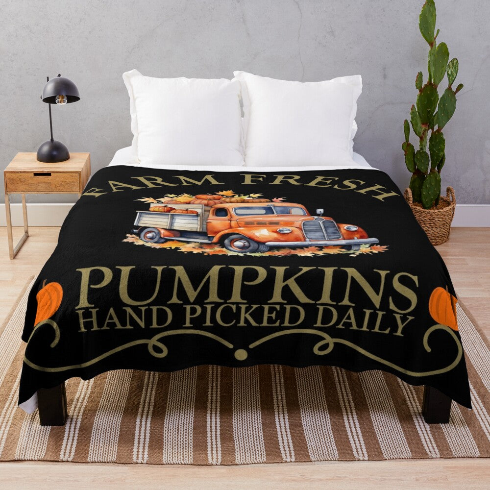 Plush blanket with watercolor pumpkin design