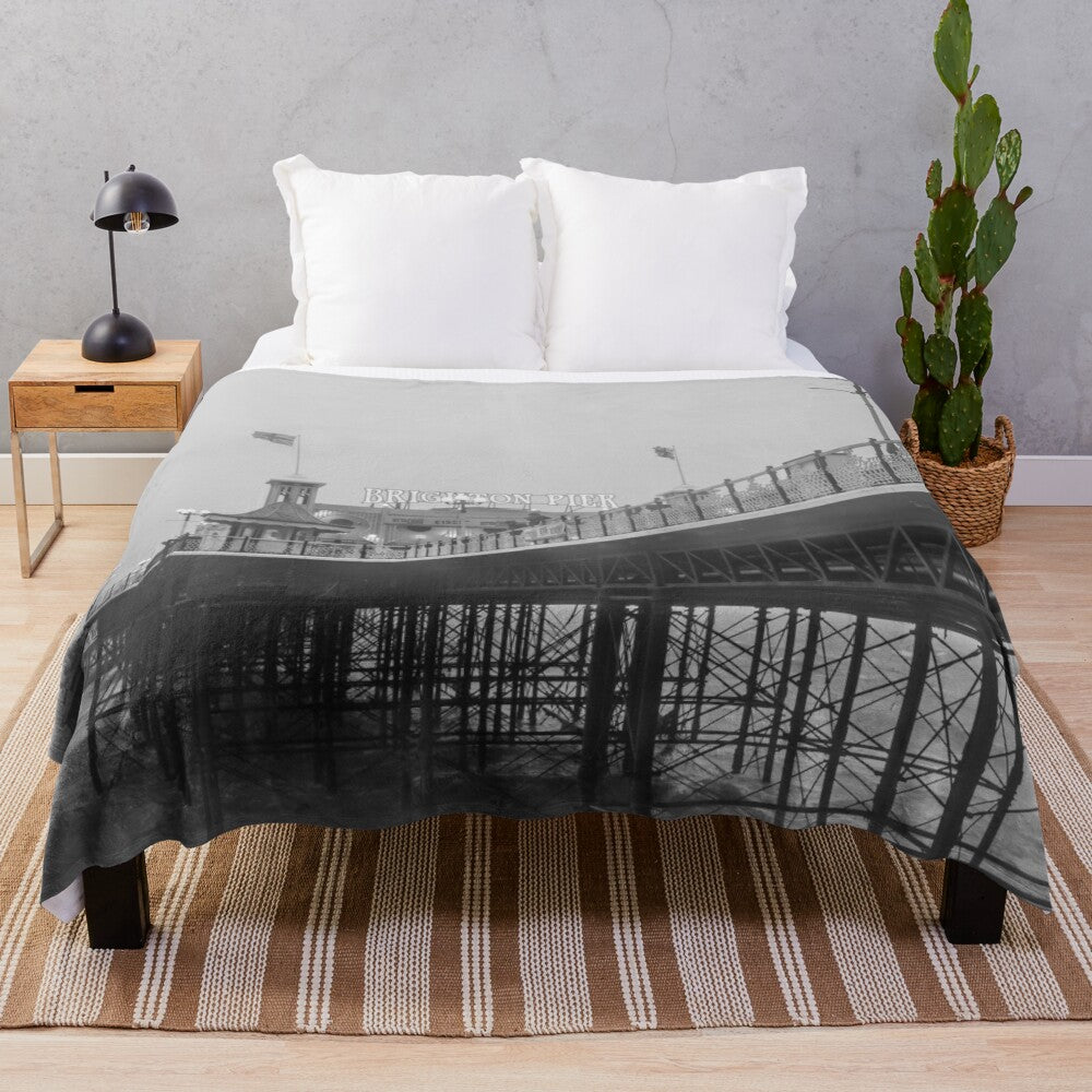 Black and white plush blanket with Brighton Pier design