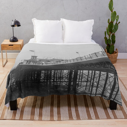 Black and white plush blanket with Brighton Pier design