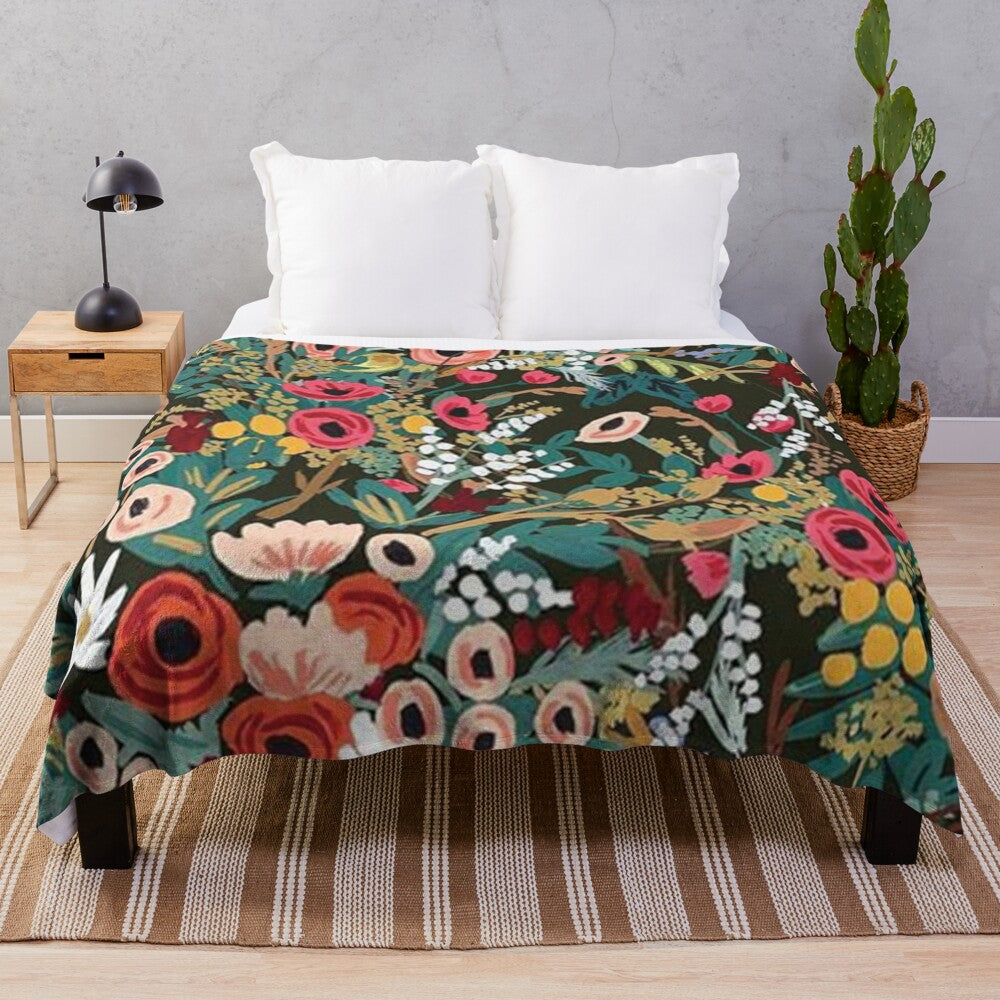 Soft and plush floral patterned blanket in black and vibrant colors