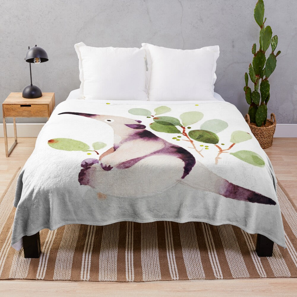 Watercolor-style illustration of a cute anteater on a plush blanket