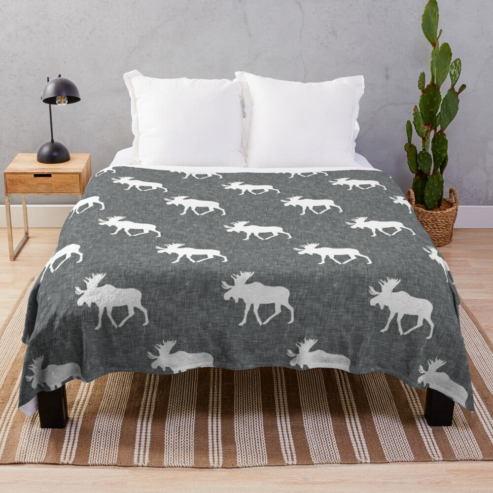 Soft and plush moose-printed grey blanket for a woodland-inspired nursery