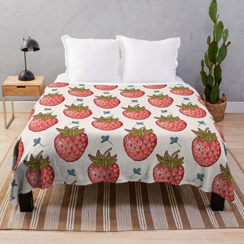 Soft and cozy plush blanket with a vibrant strawberry field pattern