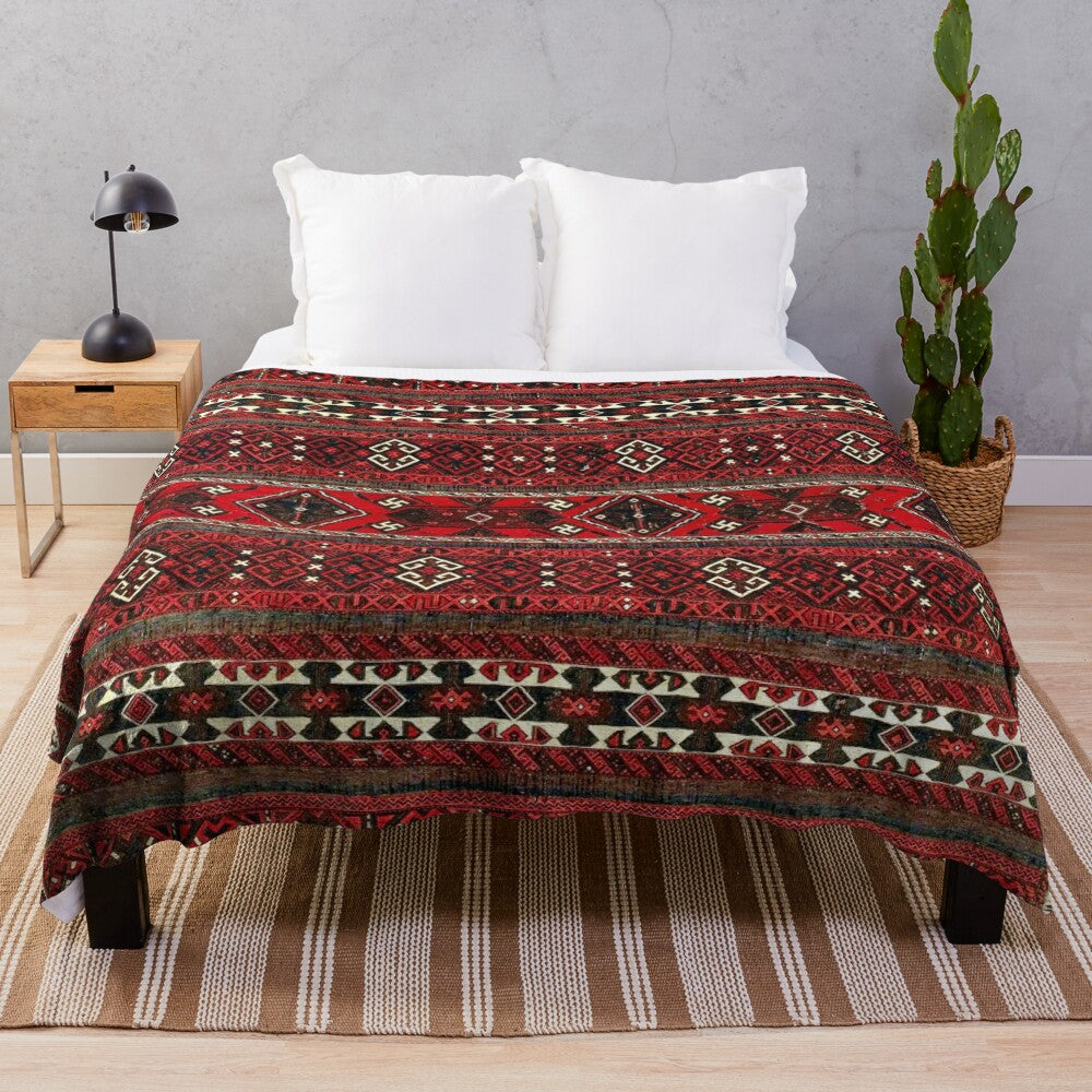 Antique-inspired plush blanket with Baluch flatweave rug design