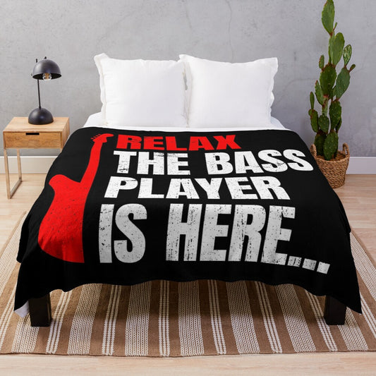 Soft plush blanket featuring a bass player design for music enthusiasts