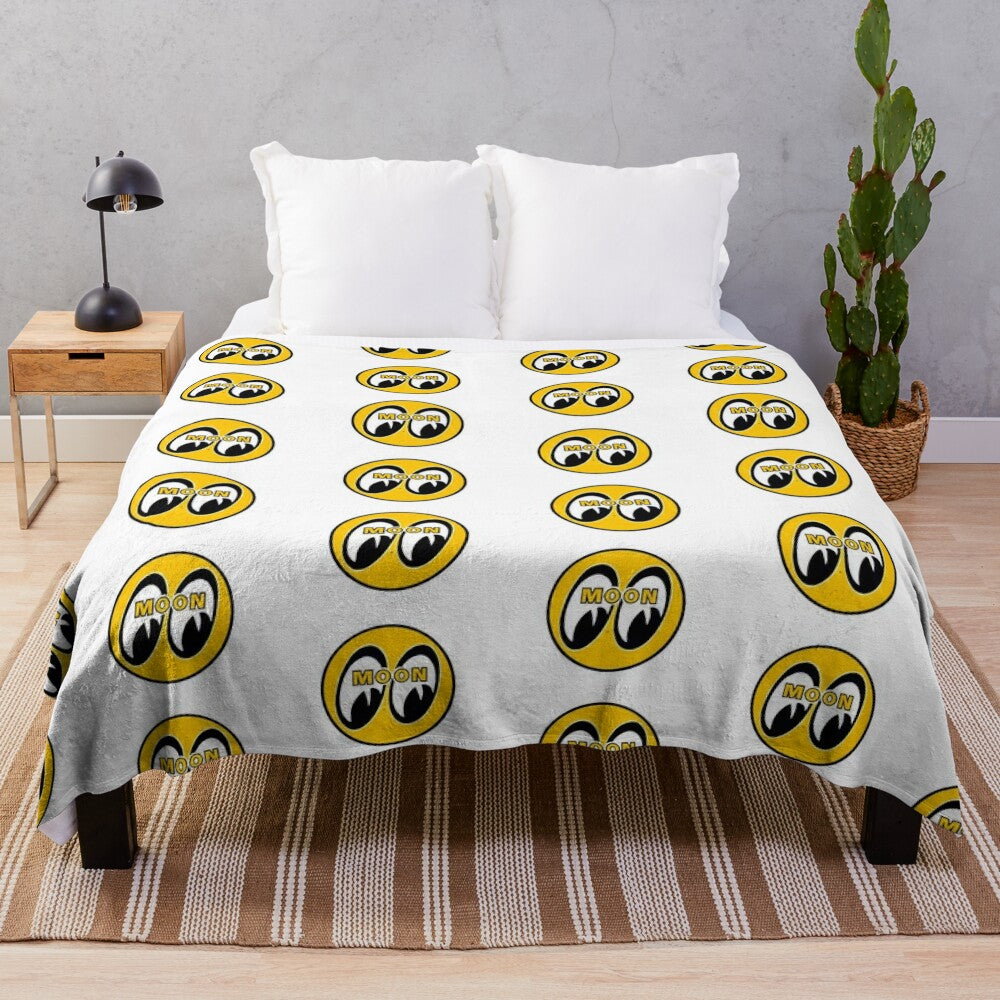 Mooneyes-inspired plush blanket featuring a moon and eye design