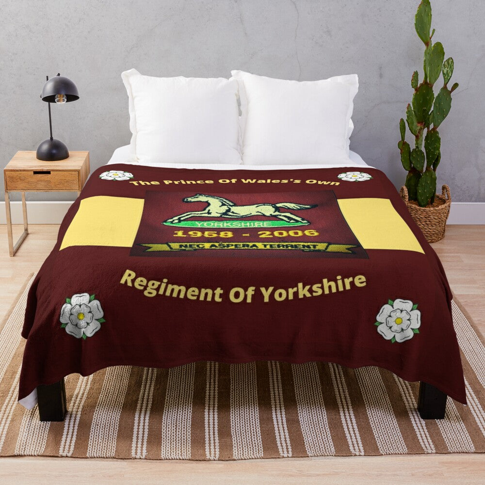 Plush blanket featuring the crest and colors of the Prince of Wales's Own Regiment of Yorkshire