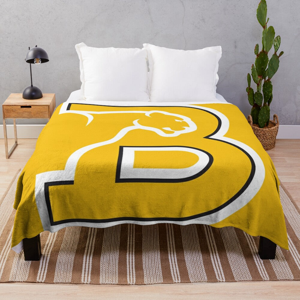 Plush blanket featuring college sports design