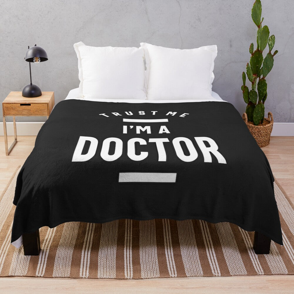 Plush blanket with doctor-themed design