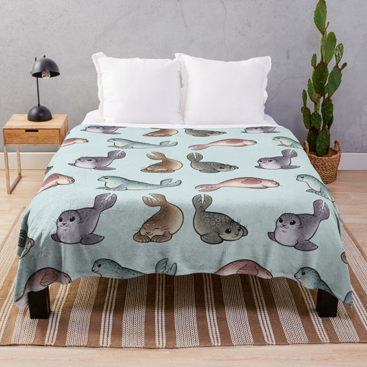 Plush blanket featuring cute and cuddly seals