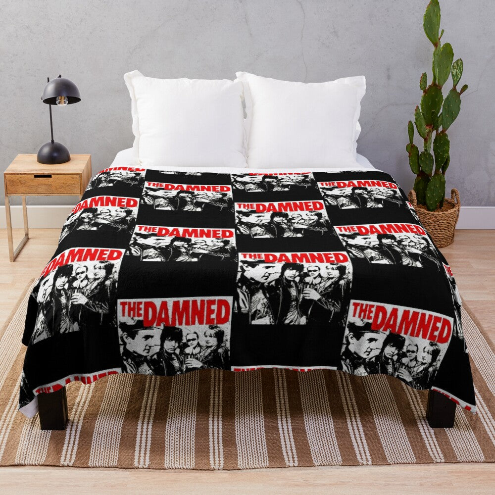 Vintage inspired plush blanket featuring the logo of the iconic punk band, The Band.