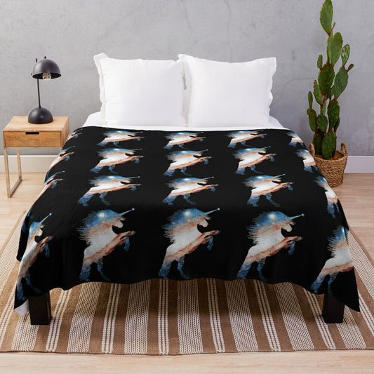 Plush blanket with a silhouette of a rearing unicorn against a galaxy background