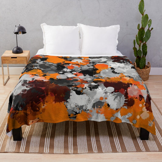 Colorful abstract paint splatter plush blanket