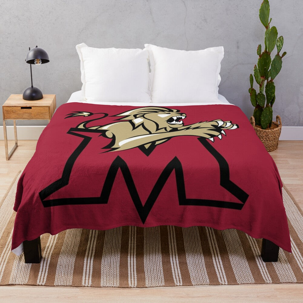 Molloy College plush blanket featuring the university logo and colors