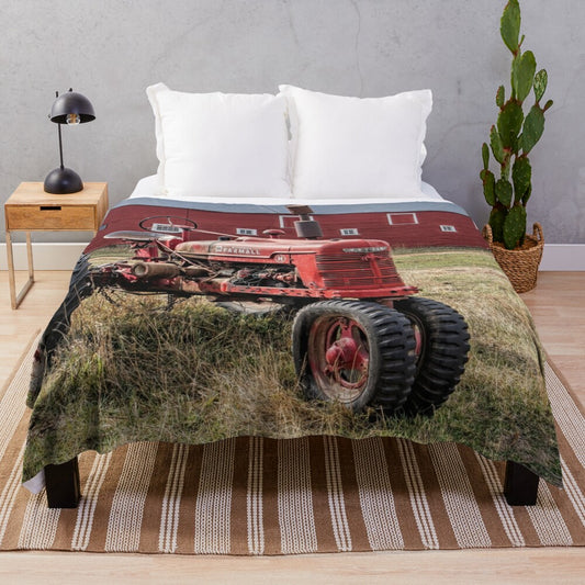 Cozy plush blanket featuring a vintage red Farmall tractor