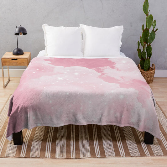 Soft and luxurious plush blanket with a whimsical pink cloud and sparkle design