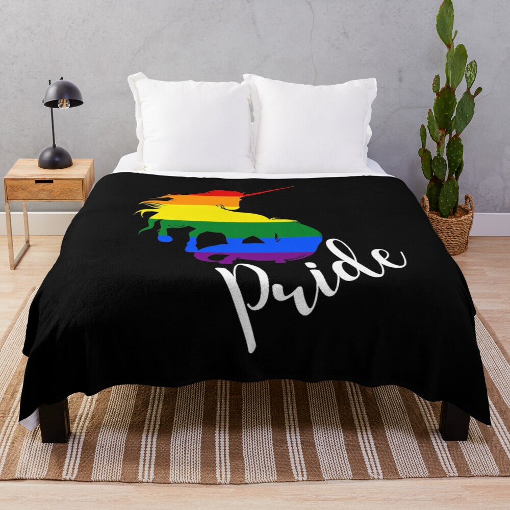 Colorful plush blanket featuring a unicorn in rainbow flag colors