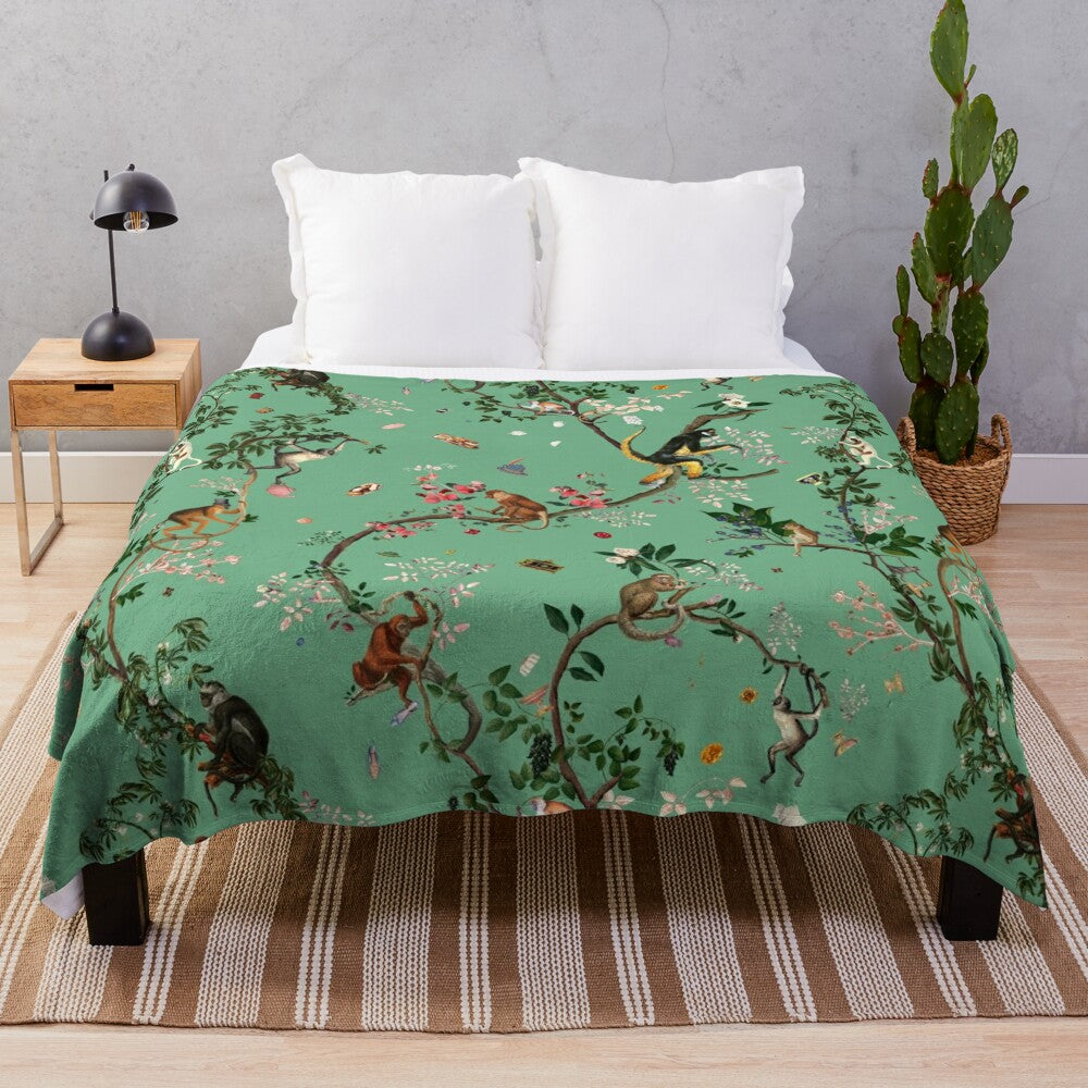 Monkey World Green Plush Blanket featuring a lush floral and botanical design