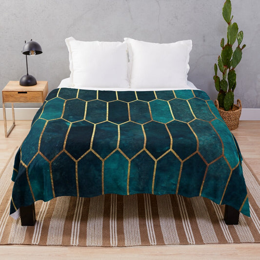 Deep teal and blue gold patterned plush blanket