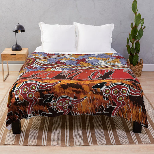 Plush blanket featuring Uluru inspired aboriginal art design