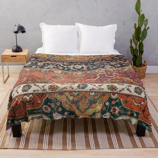 Colorful distressed vintage plush blanket with ornate persian rug pattern